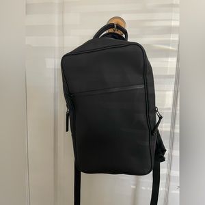 Rains black backpack zip up